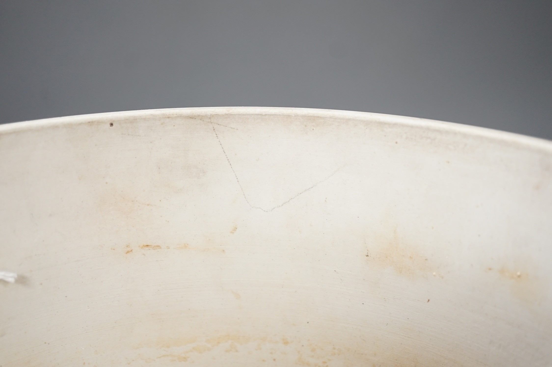 A Wedgwood blue jasper jardiniere, sprigged with muses and swags, height 23cm